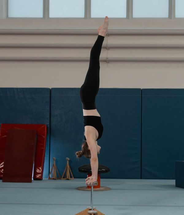 Woman performing gentle physical exercises for vitality and balance